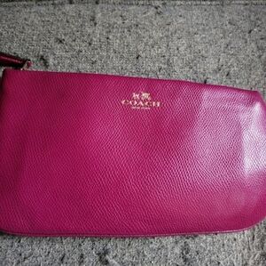 Coach fuchsia clutch
